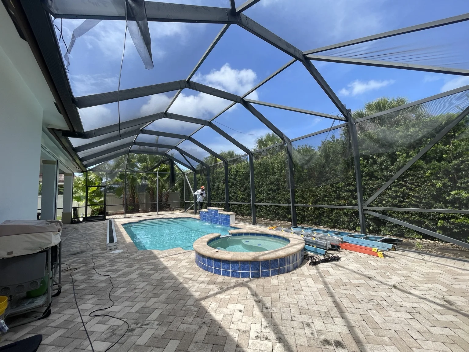 Pool enclosure rescreen in progress