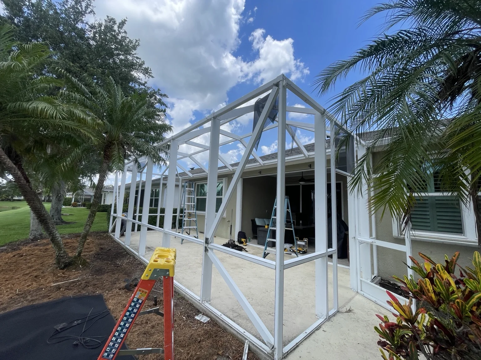 White enclosure frame during screen installation